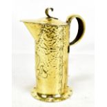 WILLIAM SOUTER & SONS; an Arts and Crafts brass water jug and cover, with planished decoration and