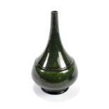 ROYAL LANCASTRIAN; a glazed conical bottle vase, finished in a mottled green glaze, impressed