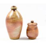 NICK REES (born 1949) for Muchelney Pottery; a stoneware bottle and small jar and cover, impressed