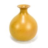 PILKINGTON'S ROYAL LANCASTRIAN; a matte finished globular vase, decorated with a pale ochre