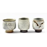 MARK GRIFFITHS (born 1956); three stoneware yunomi, various glazes, impressed marks, tallest
