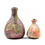 NIC COLLINS (born 1958); a wood fired stoneware bottle, incised signature, height 22cm, and