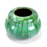 PILKINGTON'S ROYAL LANCASTRIAN; a glazed squat globular vase with turquoise and green streaked