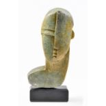 PETER HAYES (born 1946); a stoneware sculpture, 'Small Head', on slate base, painted signature,
