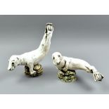 SUSAN CLAIRE PAGE (born 1952); two stoneware animal sculptures, 'Grey Seal Pups', impressed SCP