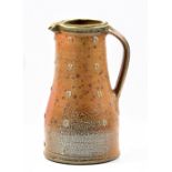 PHIL ROGERS (born 1951); a salt glazed jug with applied decoration, impressed PR mark, height 29.