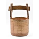MASANOBU IZUMIHARA; a large anagama fired stoneware basket form, incised marks, height 29.5cm.