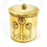 KARL DEFFNER; an Arts and Crafts brass string box of cylindrical form, relief decorated with