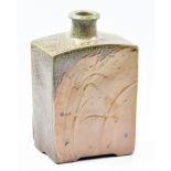 PHIL ROGERS (born 1951); a rectangular salt and shino glazed bottle with incised grass decoration,