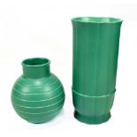 KEITH MURRAY FOR WEDGWOOD; a bulbous vase with linear incised decoration on a matte green ground,