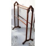 A Victorian pine towel rail with Gothic-style carving, height 91cm.