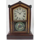 An American mantel clock, the white dial set with Roman numerals and marked for Seth Thomas,