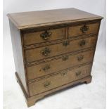 A George III oak chest of two short and three long graduated drawers, on bracket feet, width 90cm,
