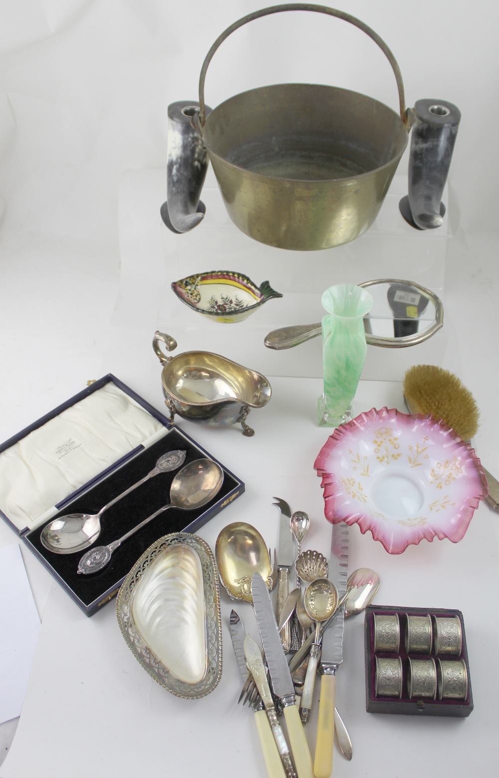 Various collectibles including brass jam pan, set of six napkin rings, green art glass vase,