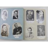 Two scrap albums containing various film actors lobby cards, mainly from the 1950s and 60s,
