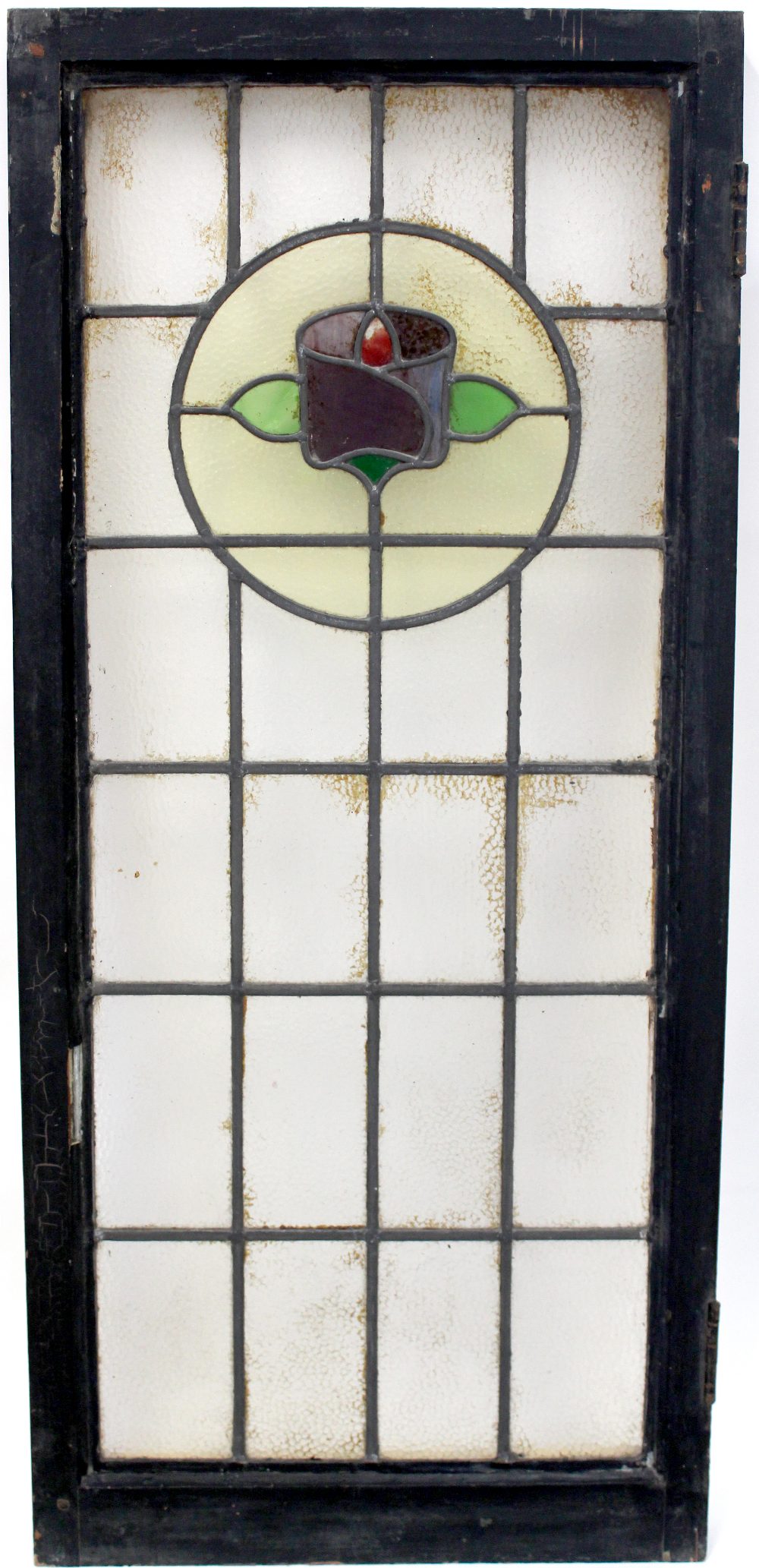 A leaded and glazed window with rose motif, in painted wooden frame, 111 x 49cm.