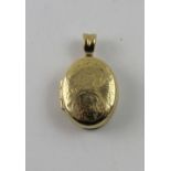 A 9ct yellow gold locket with chased decoration, approx 7g.
