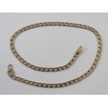 A 9ct gold curb link necklace, approx 23.1g.