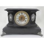 A Victorian black slate architectural cased mantel clock,