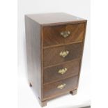 A Georgian-style oak small chest of four short drawers on block feet, height 76cm.