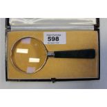 A George V hallmarked silver mounted magnifying glass with bloodstone handle, George Smith,