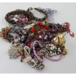 A quantity of costume jewellery to include necklaces etc and a Victorian,