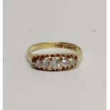 An 18ct yellow gold five-stone diamond ring, approx 50 pints, size R, approx 4g.