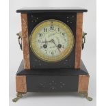 A late 19th century black slate and rouge marble mantel clock,