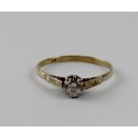 A 9ct yellow gold cubic zirconia solitaire ring, size V.
