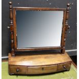 A 19th century mahogany dressing table mirror with three base drawers, height 52cm.