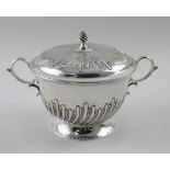 A Victorian hallmarked silver twin-handled lidded sucrier with gadrooned detail, Henry Stratford,