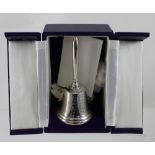 An Elizabeth II hallmarked silver limited edition commemorative bell celebrating the wedding of