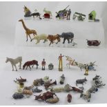 A quantity of vintage lead figures to include animals, circus folk, farm animals etc.