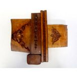 Four 19th century woodblock decorative mould and a leather paperweight,