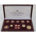 A 2002 thirteen gold coin set comprising £5, £2, £1, 50p, 20p, 10p, 5p, 2p and 1p coins,