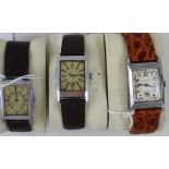 Three vintage gentlemen's wristwatches of tank form,