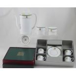 A Wedgwood part coffee set featuring gilt House of Commons emblem,