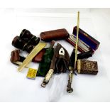 A collectors' lot to include an embossed leather cigar case, opera glasses, a cased harmonica,