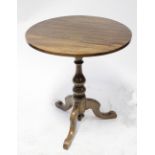 A part George III mahogany circular-topped table on carved baluster support and tripod cabriole