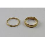 Two 22ct yellow gold wedding band rings, approx combined 5.5g (2).