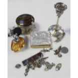 A collectors' lot to include a white metal candlestick with Eastern marks,