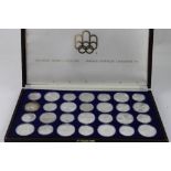 A cased set of twenty-eight silver proof Canadian Olympic coins, 1976,