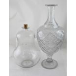An impressive large cut glass crystal decanter and stopper,