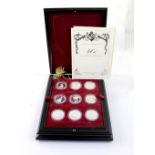 A Queen Elizabeth II eighteen silver world crown coin set from the 'Queen Elizabeth II 40th