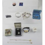A quantity of costume jewellery to include two gold necklaces, one with St Christopher,