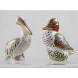A Royal Crown Derby limited edition 'White Pelican' paperweight with gold stopper and 'Green Winged