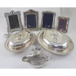 Two hallmarked silver photo frames, Edinburgh 1998 and Sheffield 1991,