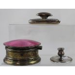 A George V hallmarked silver and pink guilloché enamel dressing table box of circular form,
