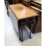 A reproduction mahogany dropleaf dining table on cabriole legs to pad feet, width 120cm.