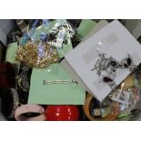 A large quantity of costume jewellery to include bangles, earrings, necklaces etc.